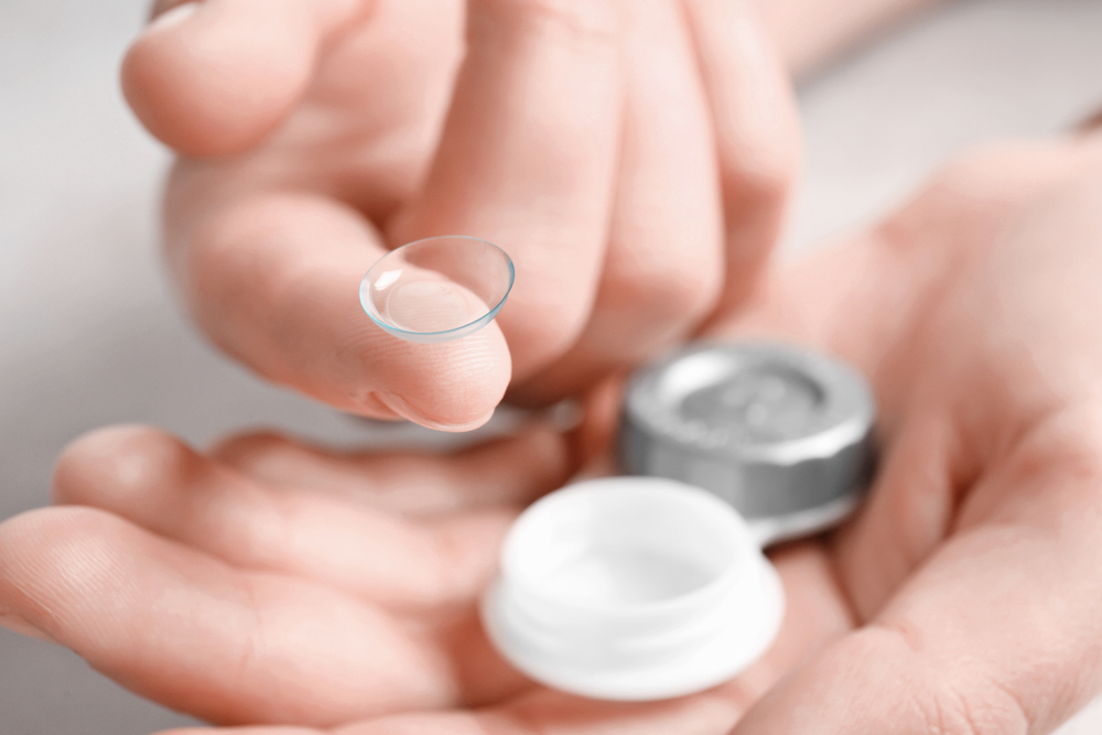 Woman,Holding,Contact,Lens,And,Case,,Closeup